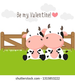 Happy Valentines Day background for greeting card. Couple of cute cows in love on green grass field.