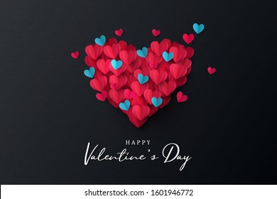 Happy Valentine's Day banner. Holiday background design with big heart made of pink, red and blue Origami Hearts on black fabric background. Horizontal poster, flyer, greeting card, header for website