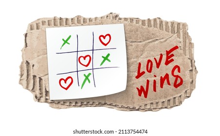 happy Valentines day banner with Tic-tac-toe game on Corrugated fiberboard background with pencil hearts. Valentines day illustration noughts and crosses game drawn love wins cardboard and flat paper