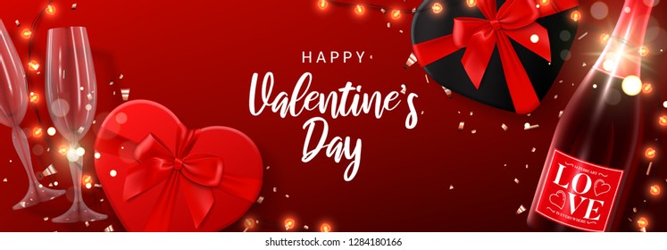 Happy Valentine's Day banner. Vector illustration with shining lights garland, realistic glasses and bottle of champagne, gift boxes and sparkling golden confetti. Holiday background, festive card.