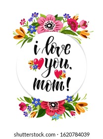 Happy Valentines Day card with calligraphy I Love You and red hearts in floral frame.Holiday card. Flower wreath with wild flowers.T-shirt design