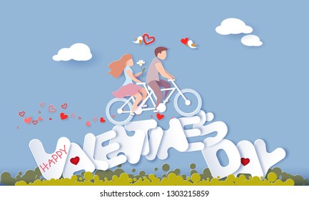 Happy Valentine's day card with couple riding bicycle over big letters on blue sky background. Vector paper art illustration. Paper cut and craft style.