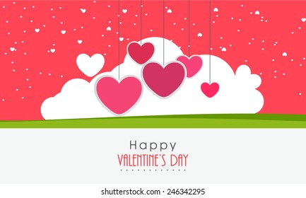 Happy Valentine's Day celebration beautiful greeting card decorated by hanging pink heart and cloud.