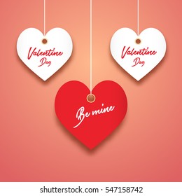Happy Valentines Day celebration card with hanging hearts. Romantic greeting banner. Creative holiday decoration.