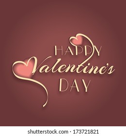 Happy Valentines Day celebration concept with golden text Happy Valentines Day and heart shape on brown background.  