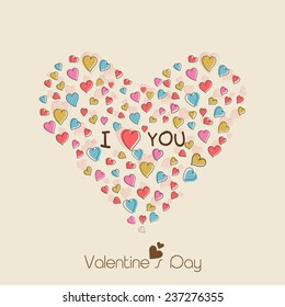 Happy Valentine's Day celebration concept with heart shape made by colorful hearts and I Love You text on beige background.