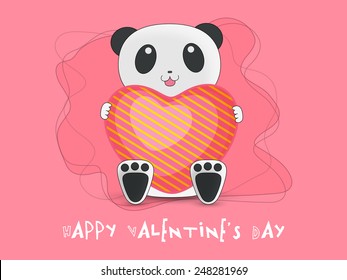 Happy Valentines Day celebration with cute teddy bear holding a beautiful heart on pink background.