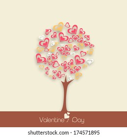 Happy Valentines Day celebration greeting card with beautiful love tree on brown background. 