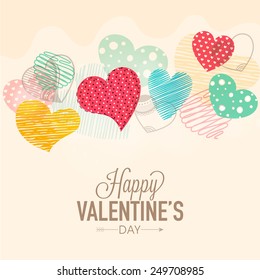 Happy Valentines Day celebration greeting card decorated by colorful creative hearts.