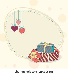 Happy Valentine's Day celebration with hanging hearts and gift boxes.