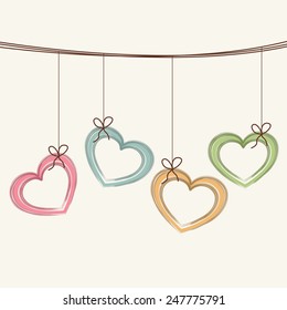 Happy Valentines Day celebration love greeting card decorated by colorful hanging hearts.
