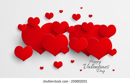Happy Valentine's Day celebration love greeting card decorated by glossy red hearts. 