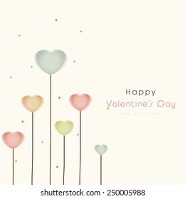 Happy Valentine's Day celebration love greeting card decorated by colorful heart shape flowers.