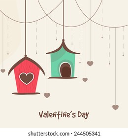 Happy Valentines Day celebration with small huts and hanging hearts.