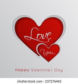 Happy Valentine's Day celebration with stylish red hearts on shiny grey background.