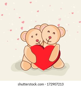 Happy Valentines Day concept with cute teddy bears holding red heart on abstract background. 