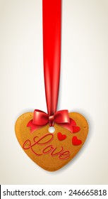 Happy valentine's day cookie in the shape of a heart with inscription "love", ribbon and bow