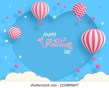 Happy Valentine's Day Font With Hot Air Balloons, Sphere, Clouds Decorated Blue Heart Shape Background.