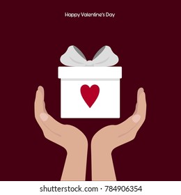 Happy Valentine's Day. Hands hold gift box with heart and  ribbon baw. Vector flat icon. Beautiful design template. 