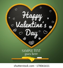 Happy Valentines Day message on the school chalkboard in shape of heart