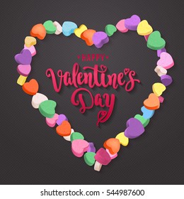 Happy Valentine's Day. Modern calligraphy style handwritten lettering with colorful hearts candy frame. Vector illustration for cards, leaflets or banners on dark background.