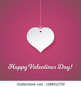 Happy Valentines day. Romantic postcard with paper heart on a thread