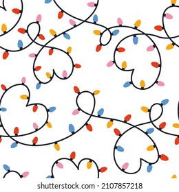 Happy Valentines day seamless pattern with lights strings and hearts for fabric, textile, wrapping paper. Hand drawn vector illustration.Love concept with garland.Romantic repeating texture background