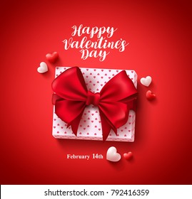 Feliz día de San Valentín de texto de saludar tarjeta vectorial diseño de banner con regalo de amor, lazo y corazones elementos en fondo rojo para la celebración del Día de San Valentín. Ilustración vectorial.
