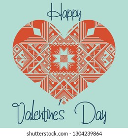 Happy Valentine's Day typography, red heart in the style of an ornament, isolated on a blue background.