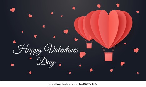 Happy valentine's day. Valentine luxury greeting card on a dark background. Two paper cut red heart shape origami made hot air balloons flying. Holiday romantic trip image. Love voyage tour