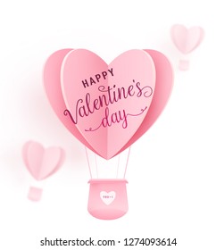 Happy valentines day vector design with paper cut pink heart shape hot air balloons flying on white background. Holiday greeting with love. Vector illustration.