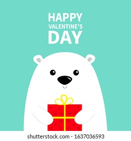 Happy Valentines Day. White polar bear cub face holding gift box present. Arctic animal. Cute cartoon baby character. Flat design. Blue background. Vector illustration