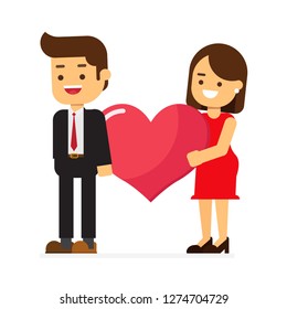 Happy valentine's day.Happy man and woman walking while carrying big heart together