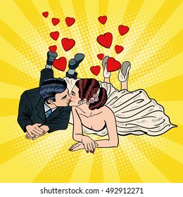 Happy Wedding Couple Kissing. Pop Art Bride and Groom. Vector illustration