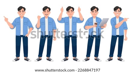 Happy white man is standing with a tablet and a glass of coffee in his hands, pointing at something, a gesture of approval, rejoicing. A young Chinese man in a blue shirt, white T-shirt and jeans