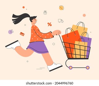 Happy woman enjoying shopping, she running with supermarket trolley and packages