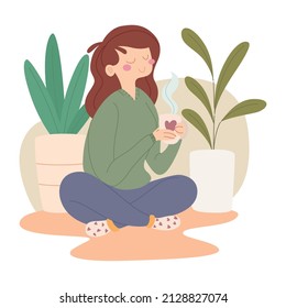 Happy woman having a cup of coffee sitting around plants Vector