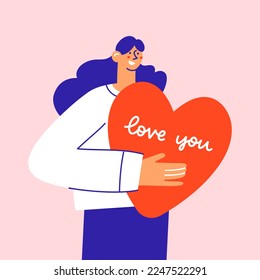 Happy woman holding a big heart. Greeting card for Valentine's Day. 