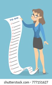 Happy woman holding long to do list.