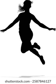 A happy woman jumping for joy in mid air silhouette person concept