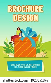 Happy woman receiving gift. Tiny cartoon character sitting on huge present box with bow flat vector illustration. Birthday, surprise, Christmas concept for banner, website design or landing web page
