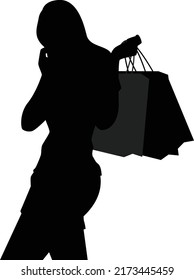 Happy woman with shopping bag in modern silhouettes