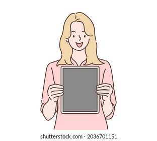 Happy woman showing blank tablet computer screen. Hand drawn in thin line style, vector illustrations.