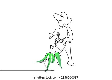 a happy woman standing watering a plant
