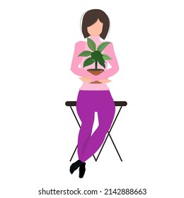 Happy woman takes care of house plants. Home gardening.