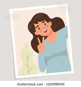 happy woman taking picture of themselves with 2 fingers 