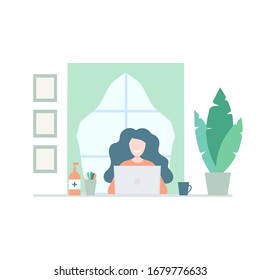 Happy women working at home with laptop. Concept of home office during coronavirus quarantine. Female freelance character sitting near window with bottle of antibacterial gel on her desk.