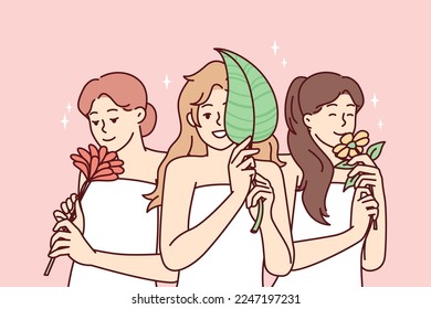 Happy women wrapped in white towels smiling after pleasant spa treatment and holding natural plants. Positive girls enjoy smell of flowers after using good shower cosmetics. Flat vector illustration