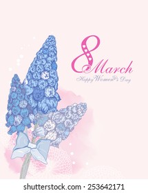 Happy Women's Day background with spring flowers. 8 March. Greeting card with text Women's Day.