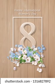 Happy women's day greeting card. Postcard on March 8. Festive background with flowers, text and glass figure 8 on wooden background